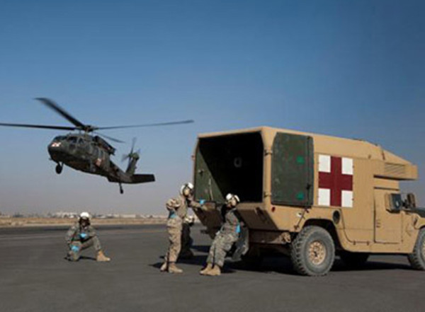A U.S. military helicopter in Afghanistan meets with service members for a medical evacuation. New research led by Washington University School of Medicine finds that when evaluating military personnel with mild traumatic brain injuries, early symptoms of post-traumatic stress are the strongest predictors of later disability.